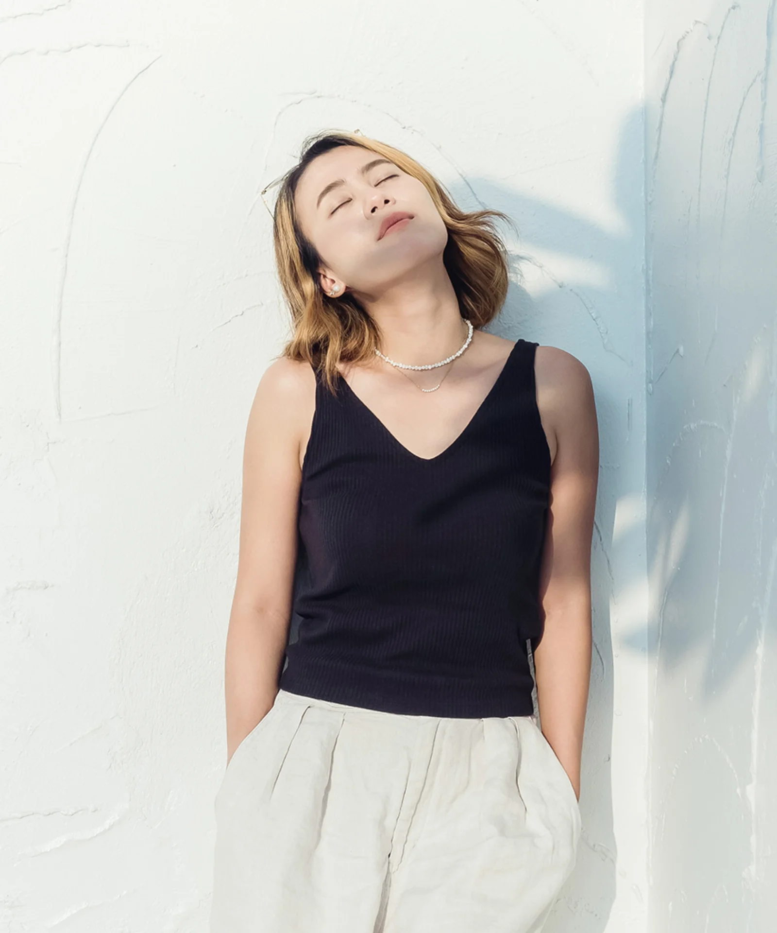 Relaxed Woman Enjoying Sunlight in Minimalist Space gft-image-mood-12.jpg