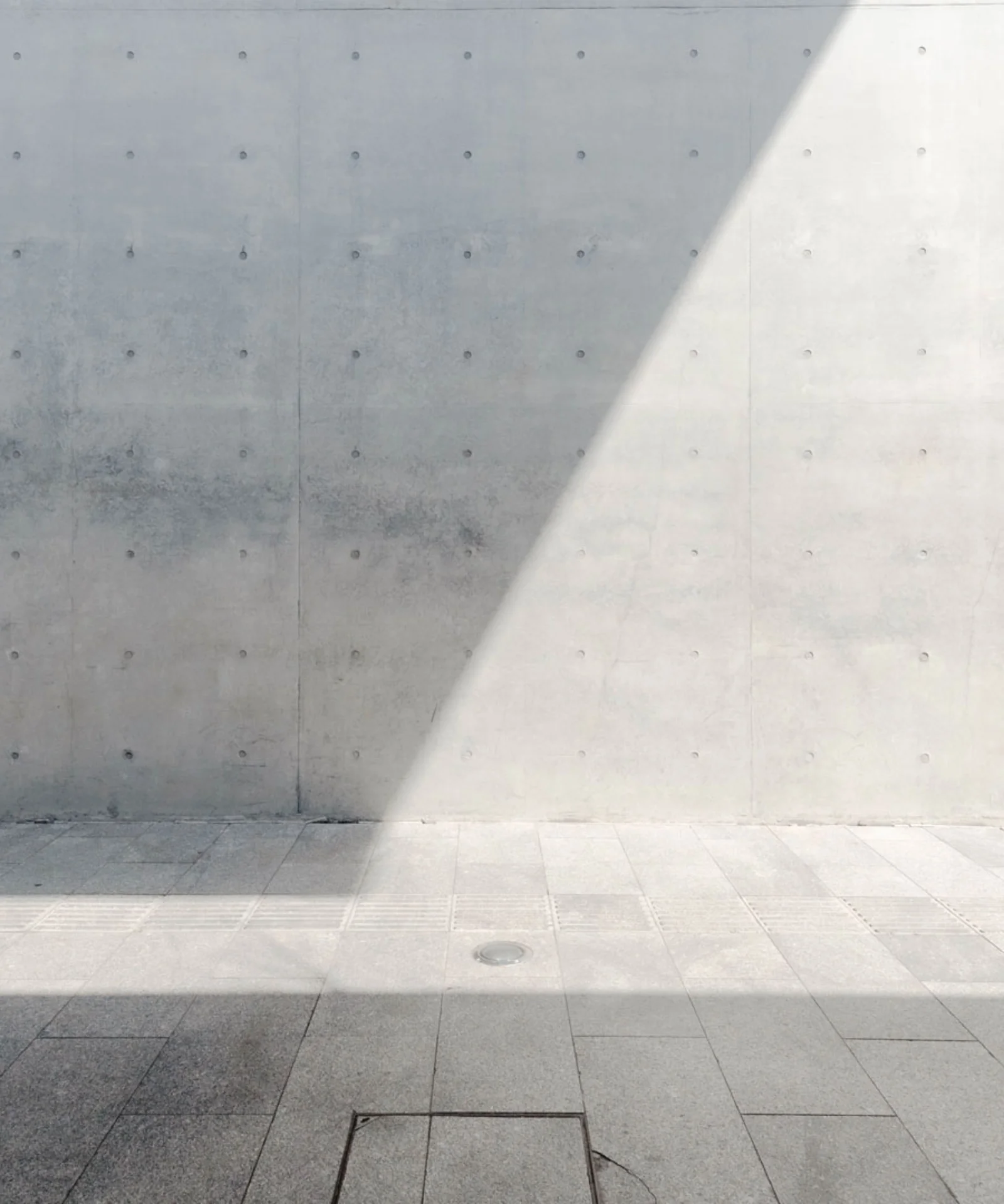Concrete wall with natural light and shadow contrast gft-background-shadow-02.jpg