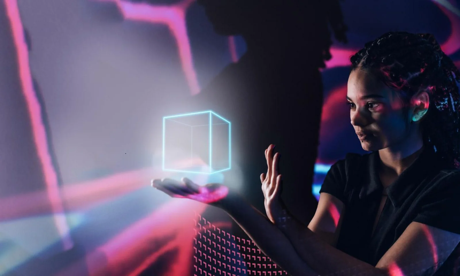 Get a sneak peek into the AI.DA Marketplace with this teaser image. Featuring a young woman engaging with a holographic cube, this visual symbolizes the innovative capabilities of the AI.DA platform. Perfect for highlighting the cutting-edge AI and data solutions offered in the marketplace, and attracting interest in the transformative potential of AI-driven technologies.