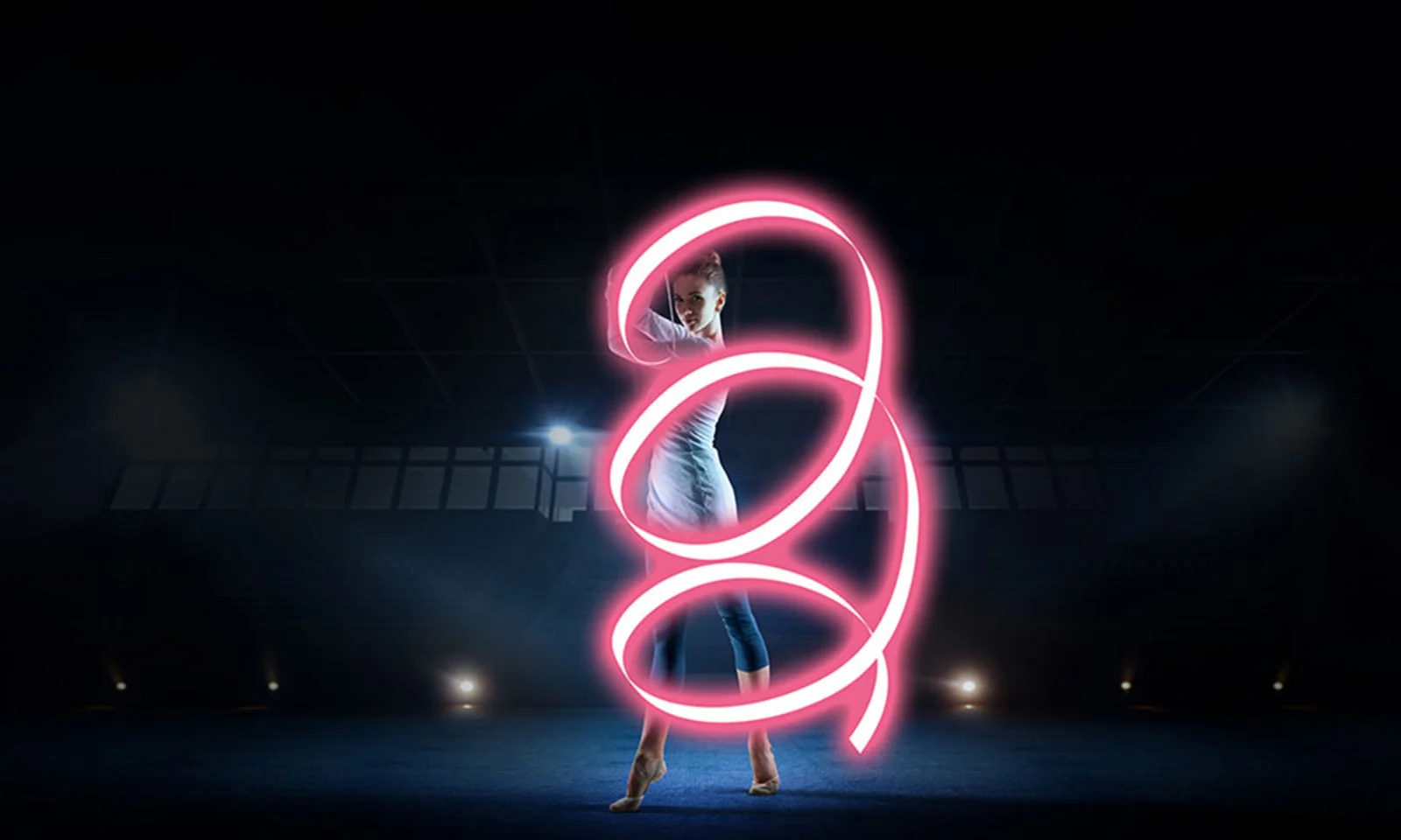 A dynamic image showcasing a woman performing a dance move with a glowing, neon-like ribbon swirling around her, symbolising the fluid and secure implementation of Vault Core technology.