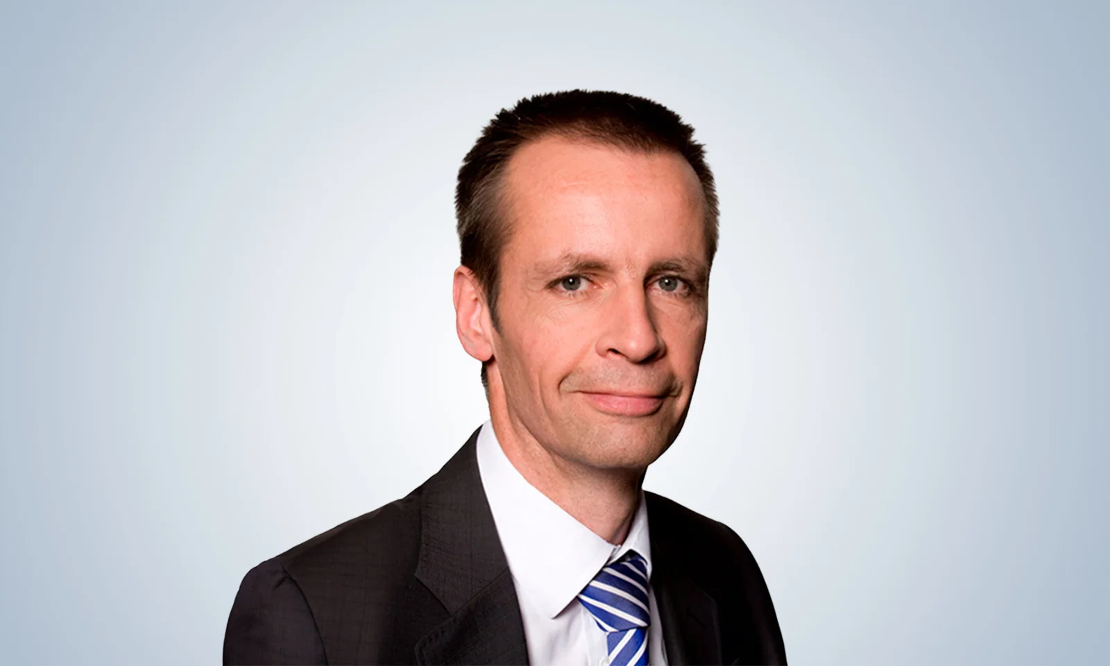 Corporate portrait of a senior executive in business attire gft-image-andreas-widemann.jpg