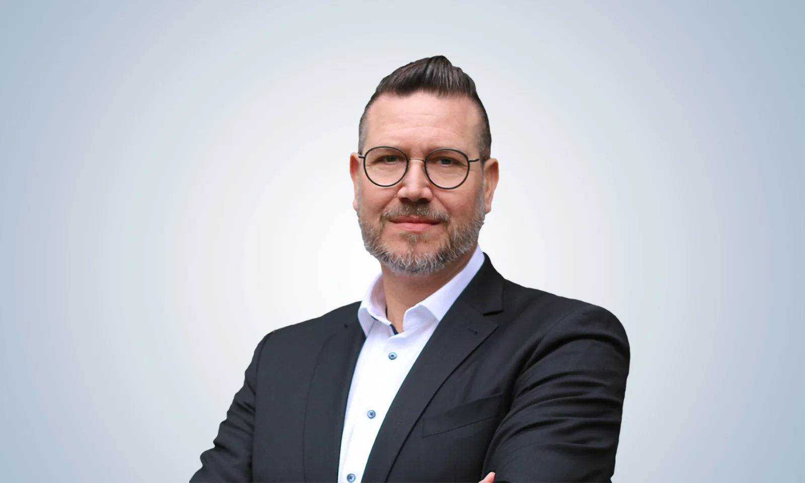 Confident Business Leader in Professional Portrait gft-contacts-andreas-herzog.jpg