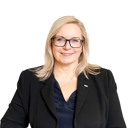 Professional portrait of Marika Lulay wearing a black blazer and glasses.