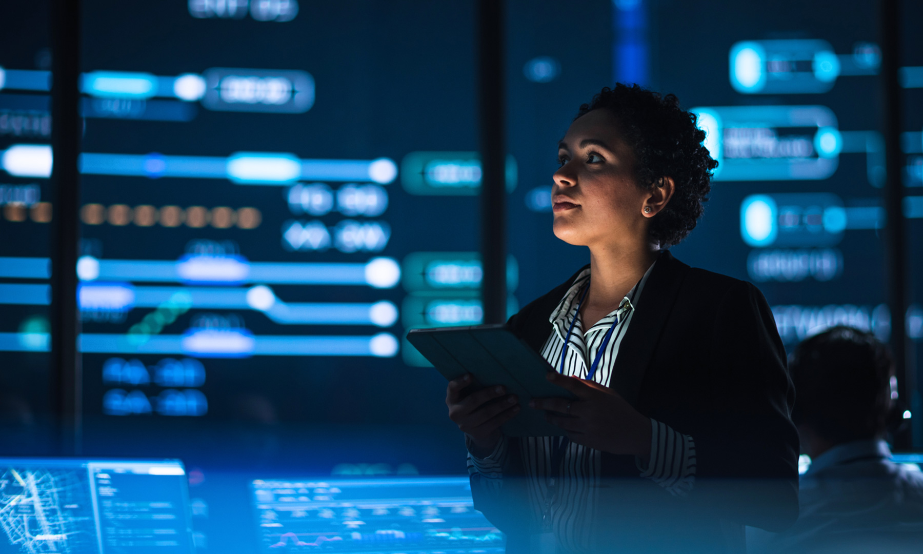 IT Professional Overseeing Digital Operations in a High-Tech Control Room gft-key-visual-global-credit-card-provider-migrates-cobol-applications.jpg